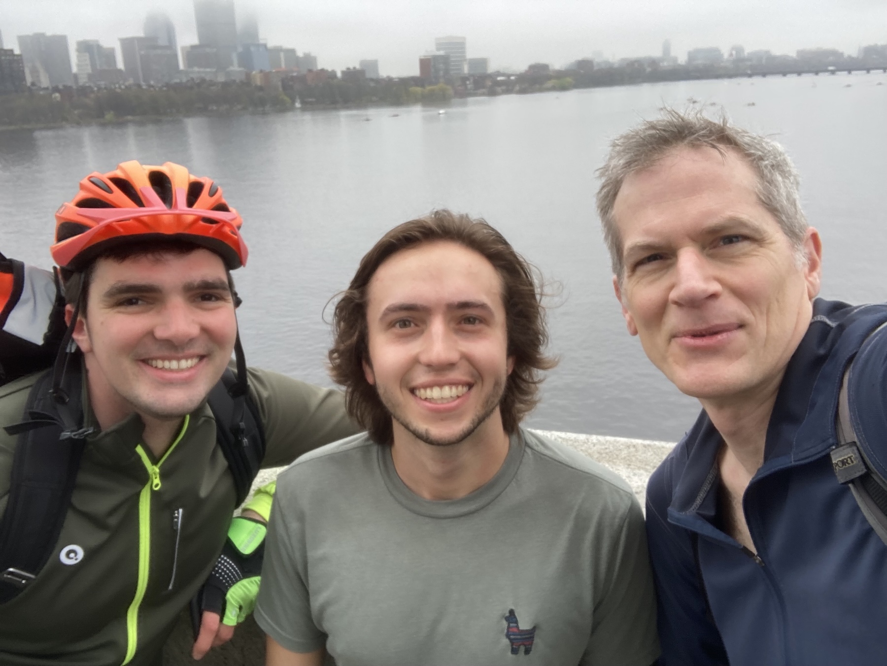 Paul, Chase, and Mark stopping on their run to pose for a photo on the bridge